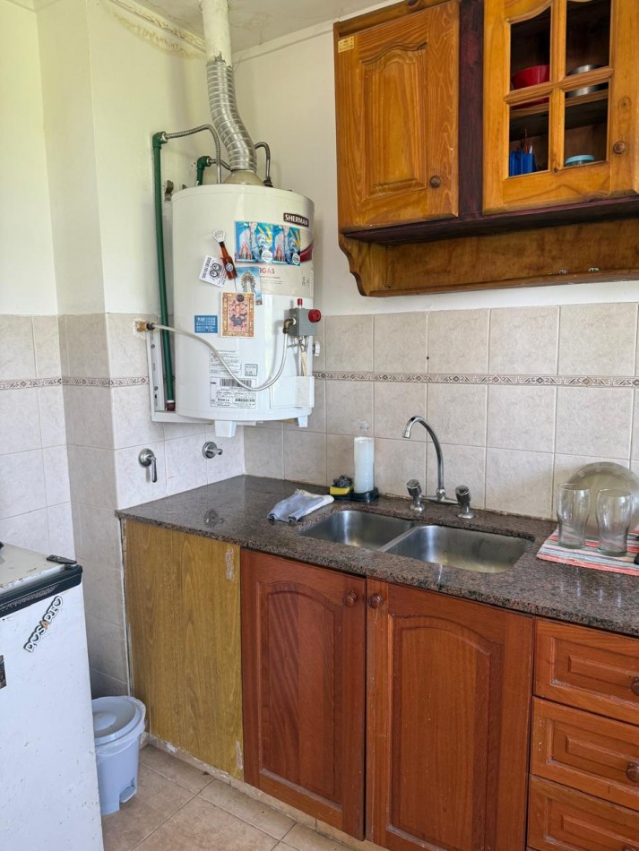 ALQUILER DTO UN DORM Y COCHERA EN 1 Y 66